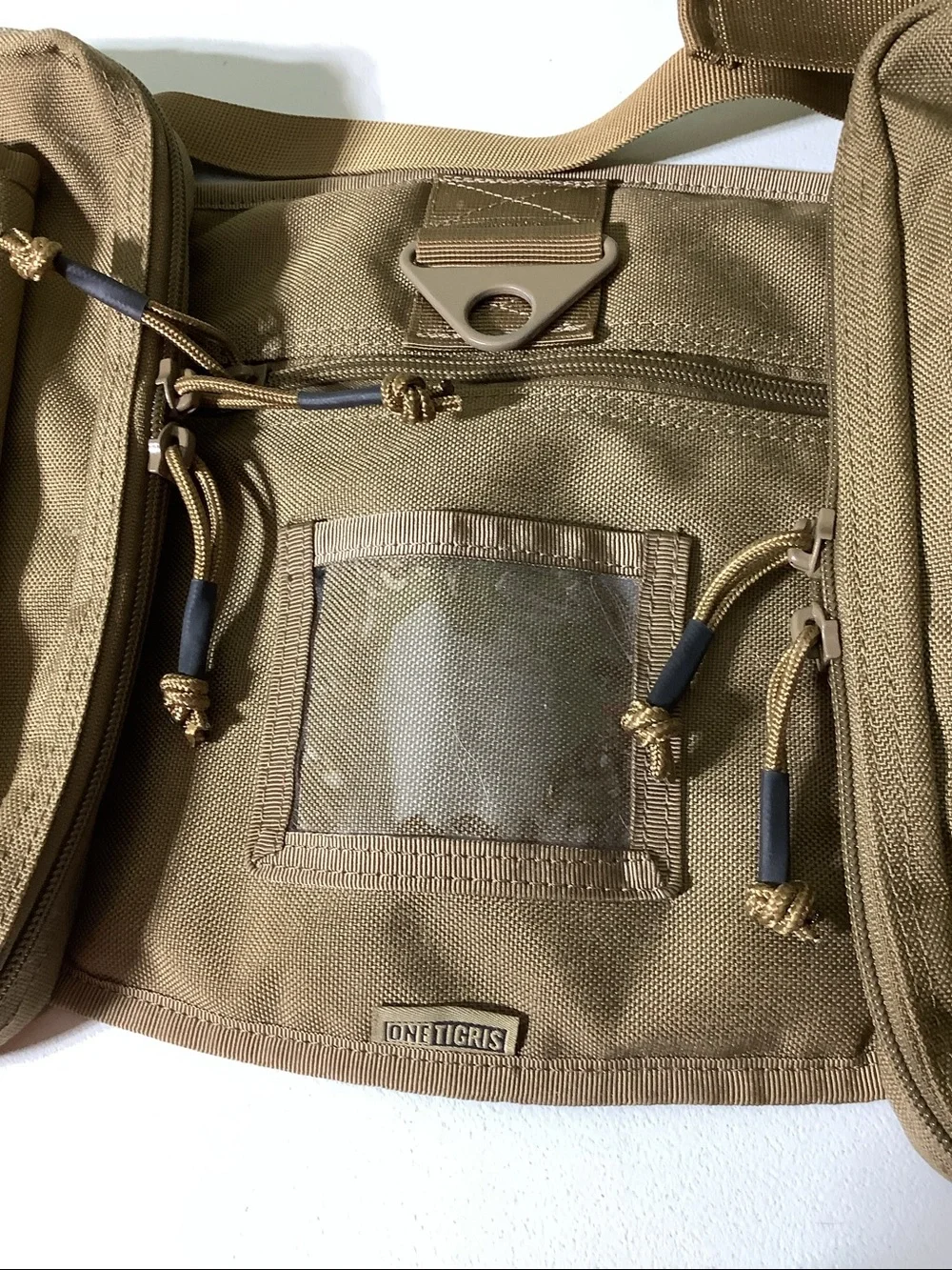 One Tigris khaki tactical pack for dogs